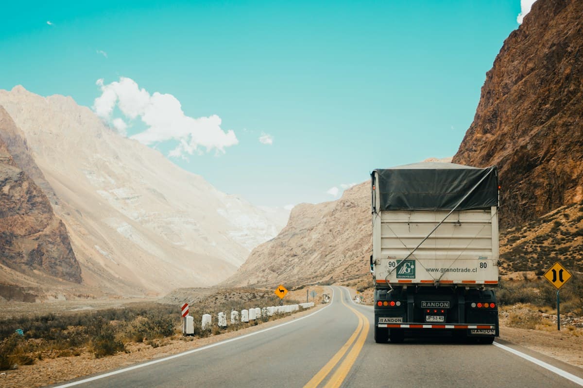 Freight truck traveling through a remote mountain pass